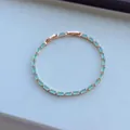 Bracelet élégant en or rose orné de pierres rectangulaires bleu clair polies - Style Carré Bleu Clair Entièrement Sertis de Strass / Or rose