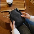 Premium black pebbled genuine leather crossbody phone bag with gold kiss-lock clasp - Black