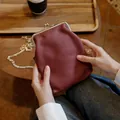 Elegant burgundy genuine leather cell phone bag with a stylish gold-tone chain - Burgundy