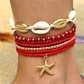 Handgemaakte Boheemse rode kralen enkelbandjes set met een gouden zeester schelp hanger - Enkelbandje / Set van 7 / Rood