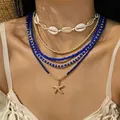 Boheemse gelaagde kralenketting set met schelpen en een gouden zeester hanger - Ketting / Meerlaagse Combinatie / Donkerblauw