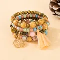 Bohemian multi-layer stretch bracelet with wooden beads, tree of life charm, and tassel. - Light Mix