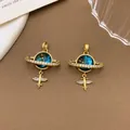Dreamy Saturn-inspired planet pendant with starry sky orb and golden finish - XL2288 Airplane Planet Pendant Gold