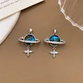 Elegant blue galaxy planet pendants with crystal encrusted ring and silver airplane charms - XL2288 Airplane Planet Pendant Silver