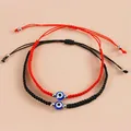 Χειροποίητα βραχιόλια Evil Eye σε κόκκινο και μαύρο με ρυθμιζόμενο πλεκτό κορδόνι - Σετ των 2 / Μαύρο & Κόκκινο
