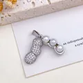 Elegant peanut-shaped opening pendant with pave-set stones and hidden pearls inside. - Three Peanuts Pearl Pendant (XL2814) / Silver