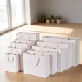 Bolsas de regalo de papel blanco de varios tamaños con asas para empaquetado - 18x10x23cm / Blanco