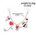 Red strawberry and heart pendant gold chain backpack charm accessory with measurements - Japanese and Korean Light Luxury Multi-Element Bag Charm (BG00148-01) / Individual Packaging