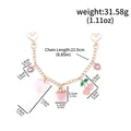Pink strawberry heart bag charm chain showing dimensions and 31.58g total weight - Sweet Pink & Gold Bag Decoration Charm (BG00148-02) / Individual Packaging