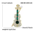 Élégante broche violon avec cristaux verts et perle, montrée avec les mesures. - Vert