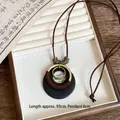 Vintage ethnic style long necklace featuring a dark wood circular pendant and cord wrapping - Vintage Round Wrapped Style (2#)