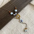 Vintage bohemian necklace featuring a wooden ring and ceramic star pendant detail. - Star Heart Ceramic Wood Ring Style (12#)