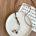 Retro ethnic style handmade necklace with wooden beads and brown adjustable cord - Waterdrop Seed Original Style (28#)