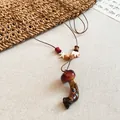 Handmade rustic mushroom pendant necklace with ethnic style beads on a brown cord - Red Mushroom Hand-made Style (56#)