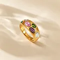 Detailed macro view of 18k gold-plated stainless steel ring with colorful zircons - Colorful Zirconia Gold