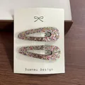 Paire de barrettes à cheveux à paillettes colorées pour filles sur carte d'affichage - Jaune pailleté fin ajouré