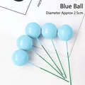 Set of 5 blue decorative ball cake toppers with 2.5cm diameter for festive parties. - Blue Ball Cake Toppers 2.5cm 10 Pieces Set