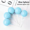 Set of 5 light blue ball cake topper picks with 4cm diameter for birthday decoration. - Blue Ball Cake Toppers 4cm 10 Pieces Set