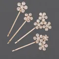Elegantes Set mit vier goldfarbenen Haarklammern mit funkelnden Strassblumen-Motiven - Blumenset-Stil / 4er Set / Gold