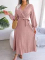 Detail view of an elegant mauve pleated maxi dress featuring a V-neck and waist tie design. - S / Top And Bottom / Pink