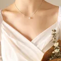 Elegant dainty silver necklace with a sparkling single zircon pendant on a woman's neck - P544 - Steel Necklace - 40+5cm