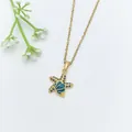 Elegante collana con pendente a stella marina e conchiglia dorata con zirconi blu. - Collana Oro Conchiglia Stella Marina Strass Blu (XL1783-178)