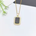 Elegante collana dorata con pendente rettangolare nero e micro zirconi incastonati. - 80*xl1997-66