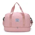Elegante borsa da viaggio rosa trapuntata con scomparto per separazione umido e secco. - Rosa