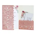 Detail of rose gold glitter laser-cut invitation card with floral pattern inserts - Pink