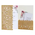 Close-up detail of laser-cut gold glitter invitation card with elegant floral insert - Gold Yellow