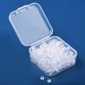 Detailansicht von transparenten Silikon-Ohrringverschlüssen in einer kleinen Box. - Pflaumen Silikon (Mit Box) / 300 Stück