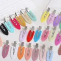 Vue détaillée de barrettes à cheveux colorées sans trace dans divers tons pastels - Style Plastique / Aléatoire