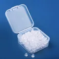 Nahaufnahme von transparenten Ohrringverschlüssen in einer durchsichtigen Kunststoffbox - 6mm Großes Silikon (Mit Box) / 200er-Pack