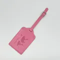 Durable pink faux leather luggage tag with embossed world map and airplane design - Luggage Tag / Pink