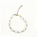 Close-up of baroque pearl bracelet with gold-toned spacer beads and lobster clasp - 10mm Irregular Bead (423)