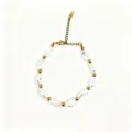 Close-up showing textured irregular baroque pearls and gold beads on a delicate chain. - Bright Gold Hardware Style (423)
