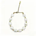 Close-up detail of baroque irregular pearl bracelet with gold spacer beads and chain - Pearl White Irregular Bead (423)