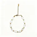 Detailed view of irregular baroque pearl bracelet featuring gold spacer beads and chain - Polished Bead Accent (423)