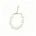 Detailed view of a baroque pearl bracelet with elegant golden spacer beads. - Large Irregular Pearl (423)