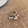 Elegant silver-toned open ring featuring dangling pearls and crystal tassel charms - One Size / Adjustable Pearl Tassel Style / Silver