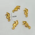 Detail view of five small golden seahorse charms for DIY jewelry making 1.8cm size - Small Seahorse / 5 Pieces / Gold