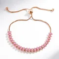 Détail d'un bracelet réglable en or rose avec des zircons roses de taille marquise - Marquise Style / Champagne (Strass Rose)