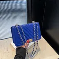 Blue quilted leather shoulder bag with gold-tone chain strap and stylish turn-lock closure - Dark Blue