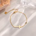 Pulsera elegante de acero de titanio dorado con dije de cruz y cristal para mujer - Pulsera de Cruz Dorada
