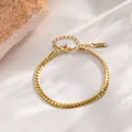 Elegante pulsera de acero de titanio chapado en oro con cadena de serpiente - Pulsera De Cadena Con Forma De Látigo Oro