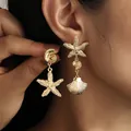 Orecchini asimmetrici a stella marina e conchiglia dorati perfetti per stile spiaggia - Trio Asimmetrico Conchiglia a Stella Marina Conchiglia (6514701)