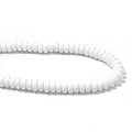 Detailed close-up of white polymer clay flat round wheel spacer beads for DIY jewelry - White