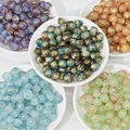 Primo piano di perle di vetro colorate 8x10mm assortite per la creazione di gioielli - Perlina a Disco 8# (8x10mm) / Marrone