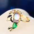 Macro view of iridescent moonstone ring with mermaid tail colorful gemstone design - Green Mermaid Tail Style (R05513-01) / Gold