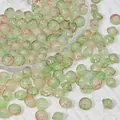 Vista ravvicinata di perle di vetro 8x10mm verdi e rosse per la creazione di gioielli - Perlina a Disco 3# (8x10mm) / Rosa e Verde